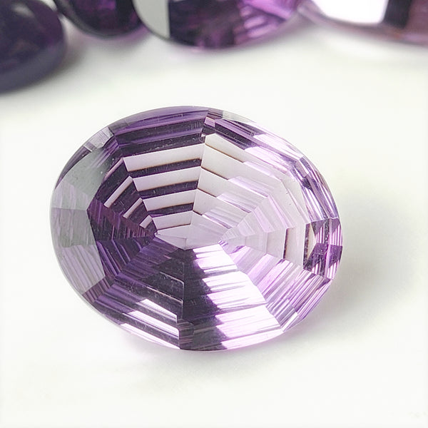 Amethyst 21x17mm Oval Fantasy Cut Gemstone