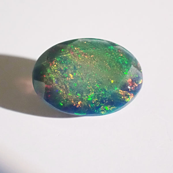 Black Opal 10.2x7.4mm Faceted Oval Gemstone
