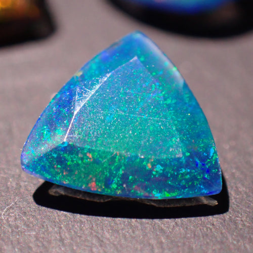Black Opal 7.8mm Triangular Faceted Gemstone