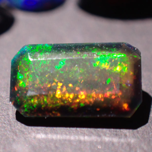 Black Opal 8.7x5mm Emerald Cut Gemstone