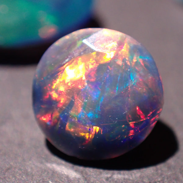 Black Opal 6.7mm Faceted Round Gemstone