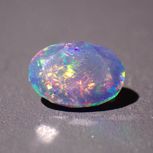 Black Opal 10.5x7.5mm Faceted Oval Gemstone